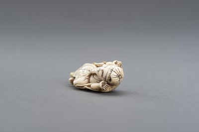 Lot 417 - AN IVORY NETSUKE OF A JOYFUL SENNIN, EDO PERIOD