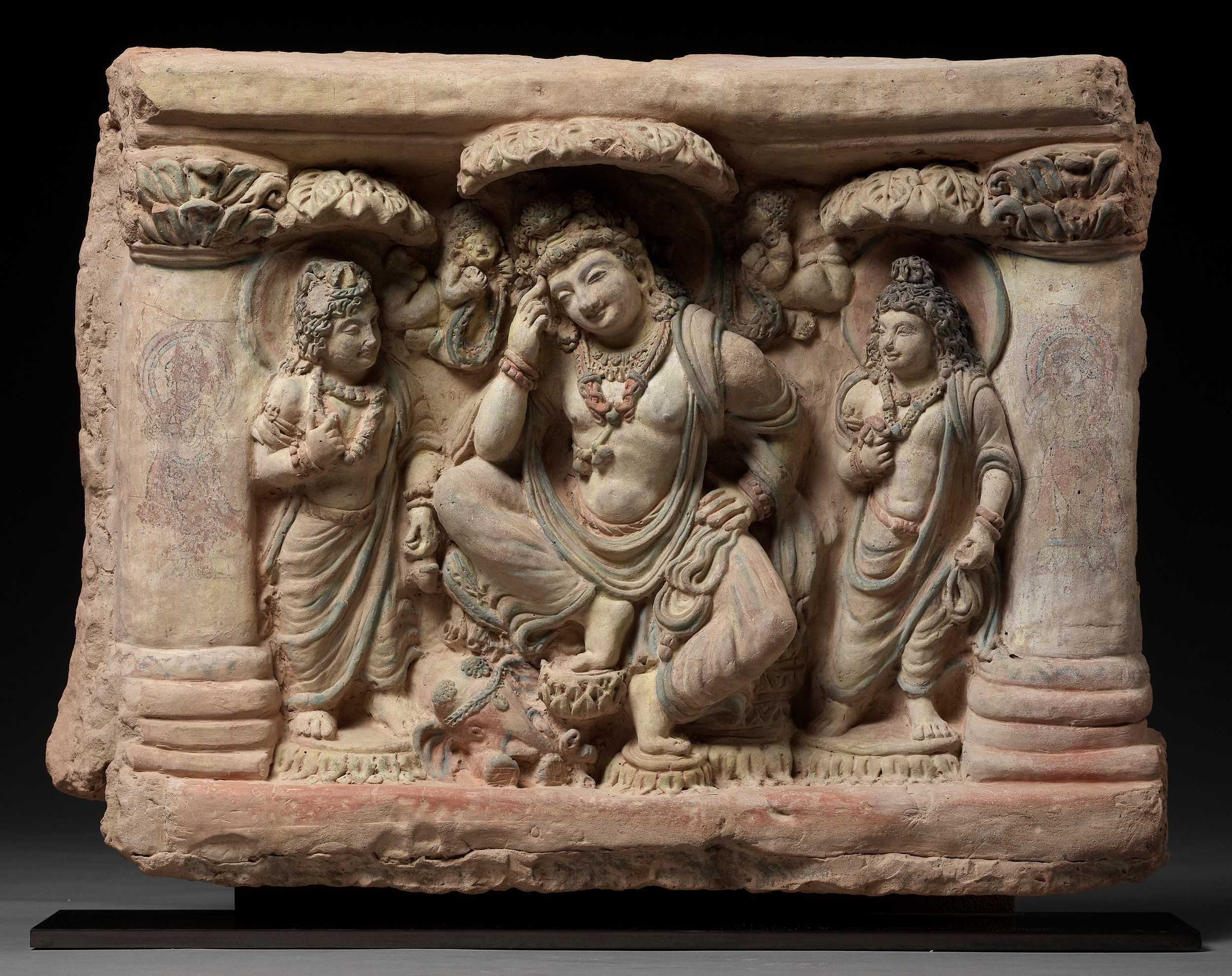 Lot 215 - AN EXTRAORDINARILY RARE AND SPECTACULAR TERRACOTTA RELIEF OF A THINKING PRINCE SIDDHARTA UNDER THE BODHI TREE, ANCIENT REGION OF GANDHARA