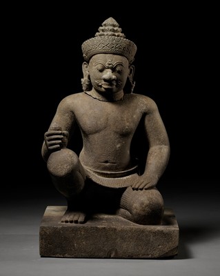 Lot 264 - A SANDSTONE GUARDIAN FIGURE DEPICTING A YAKSHA, KOH KER STYLE