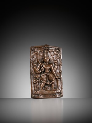 Lot 907 - A CEREMONIAL COPPER SHIELD DEPICTING VIRABHADRA, 17TH-18TH CENTURY