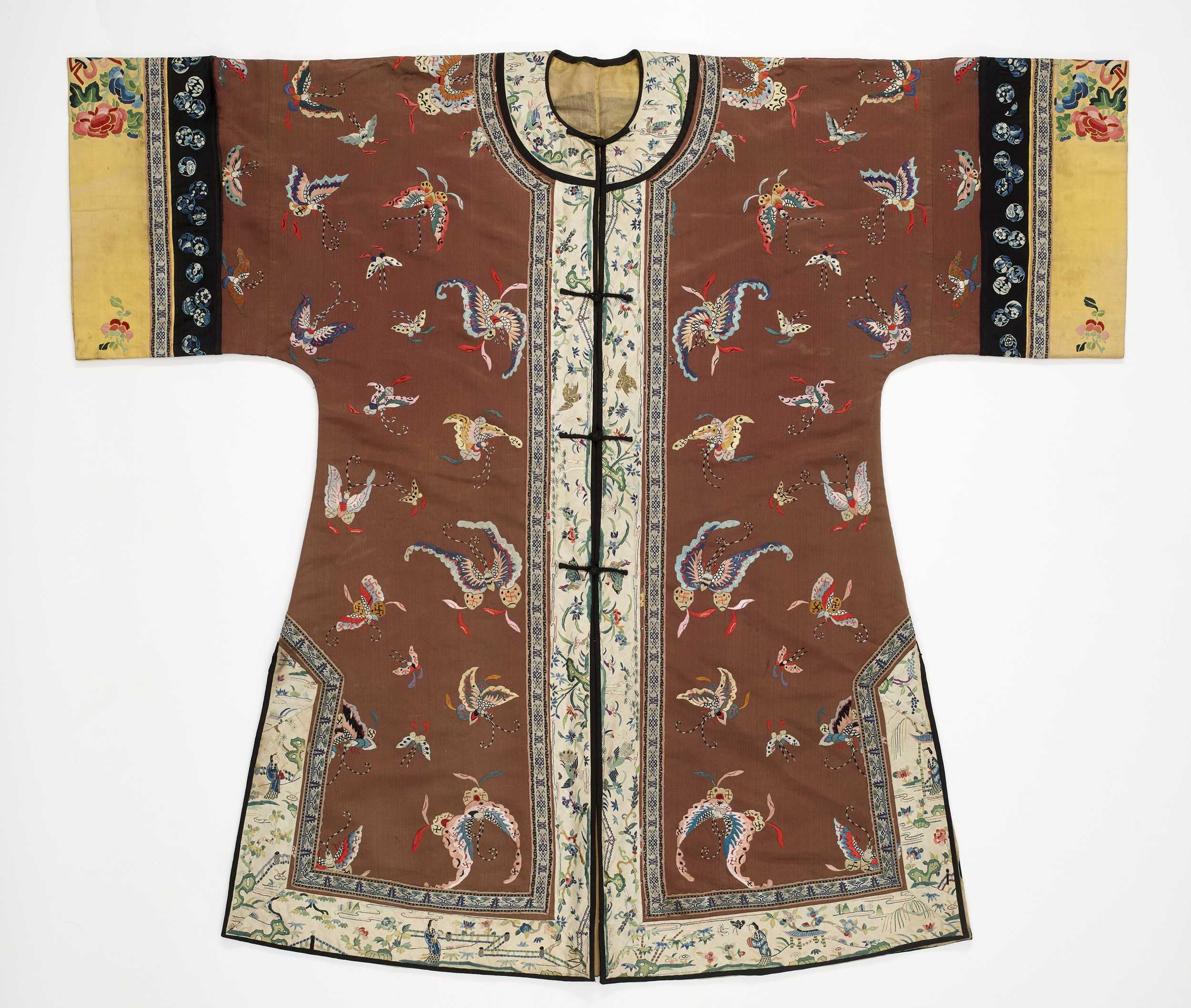 Lot 589 - A BROWN EMBROIDERED SILK ‘BUTTERFLIES’ LADY’S INFORMAL ROBE, QING DYNASTY