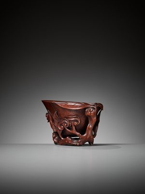 Lot 283 - A COPPER-RED LACQUERED BAMBOO ‘LINGZHI’ LIBATION CUP, MING DYNASTY