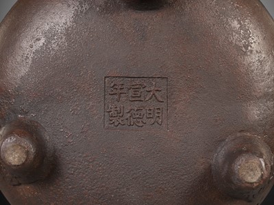 Lot 28 - A LARGE ARCHAISTIC CAST IRON TRIPOD CENSER, MING DYNASTY