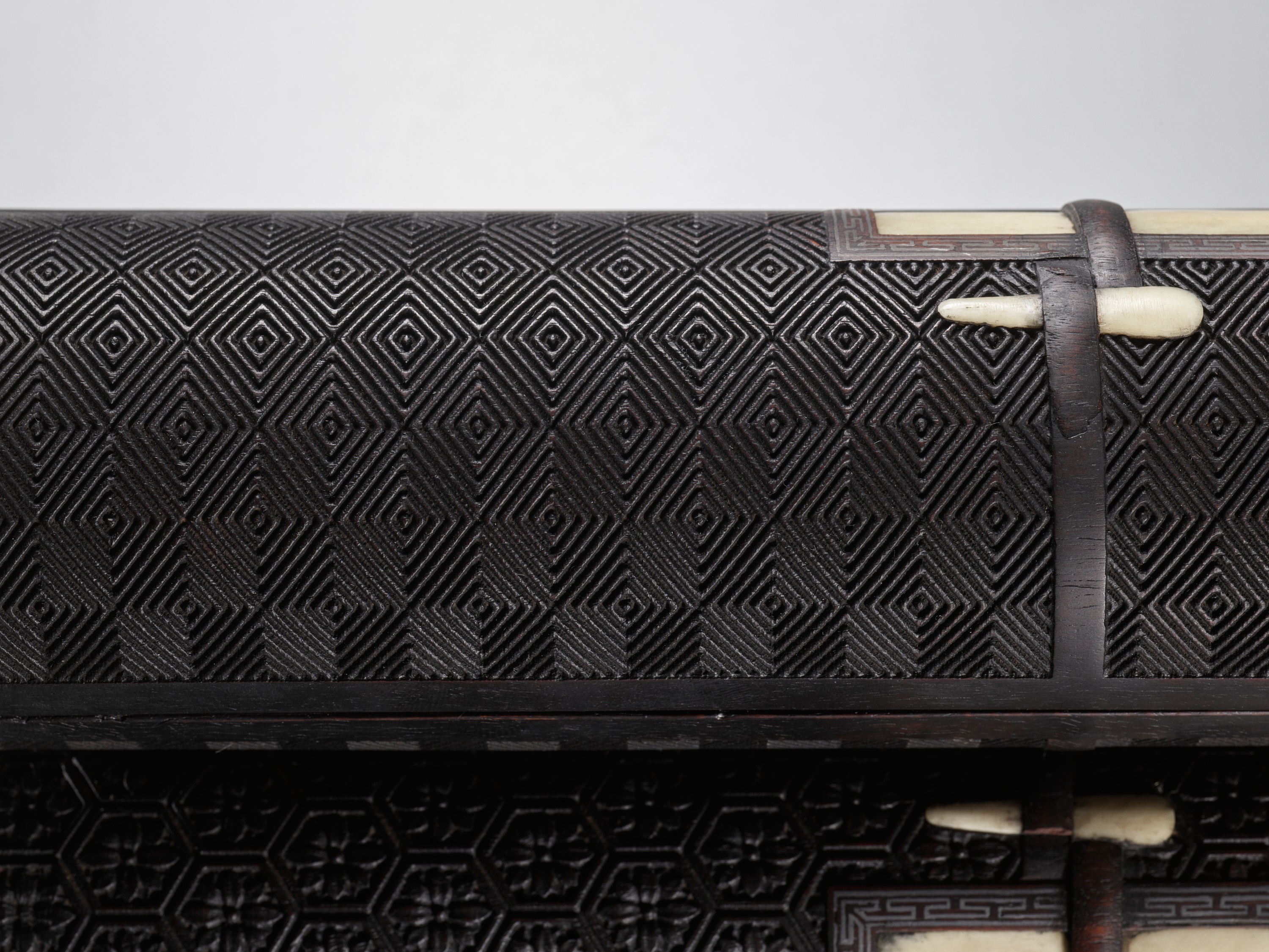 Lot 17 - AN IMPERIAL SCROLL-SHAPED ZITAN BOX AND COVER,