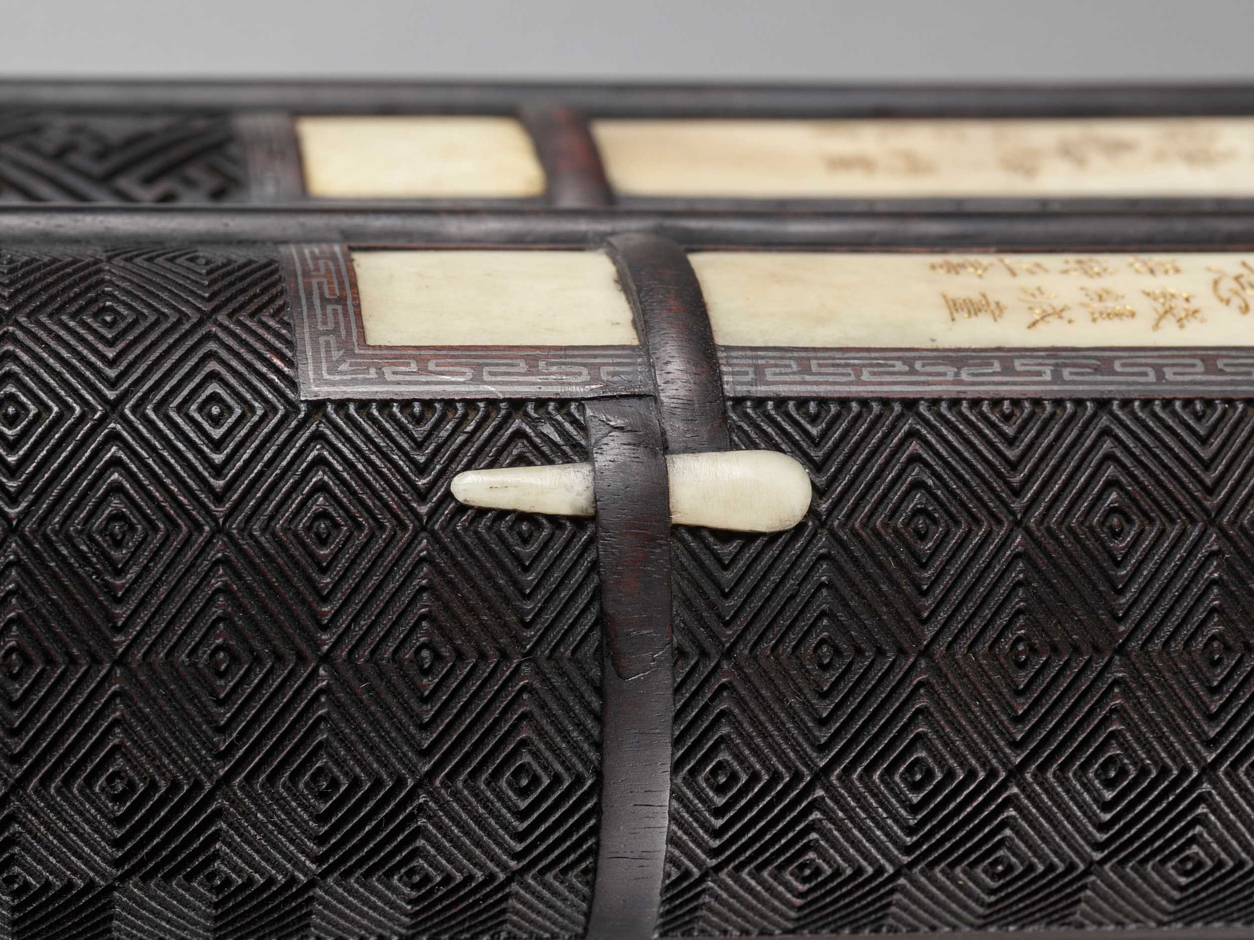 Lot 17 - AN IMPERIAL SCROLL-SHAPED ZITAN BOX AND COVER,