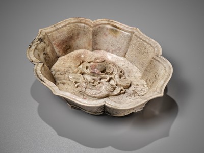 Lot 47 - A CHICKEN BONE JADE ‘DOUBLE FISH’ MARRIAGE BOWL, 17TH-18TH CENTURY