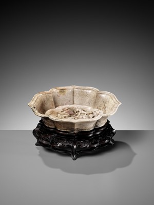 Lot 94 - A CHICKEN BONE JADE ‘DOUBLE FISH’ MARRIAGE BOWL, 17TH-18TH CENTURY