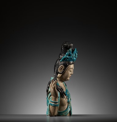 Lot 67 - A LARGE AND MASSIVE FAHUA-GLAZED STONEWARE BUST OF GUANYIN, MING DYNASTY