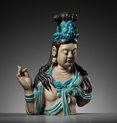 Lot 105 - A LARGE AND MASSIVE FAHUA-GLAZED STONEWARE BUST OF GUANYIN, MING DYNASTY