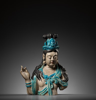 Lot 67 - A LARGE AND MASSIVE FAHUA-GLAZED STONEWARE BUST OF GUANYIN, MING DYNASTY