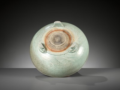 Lot 69 - A CARVED AND MOLDED LONGQUAN CELADON TRIPOD CENSER, MING DYNASTY