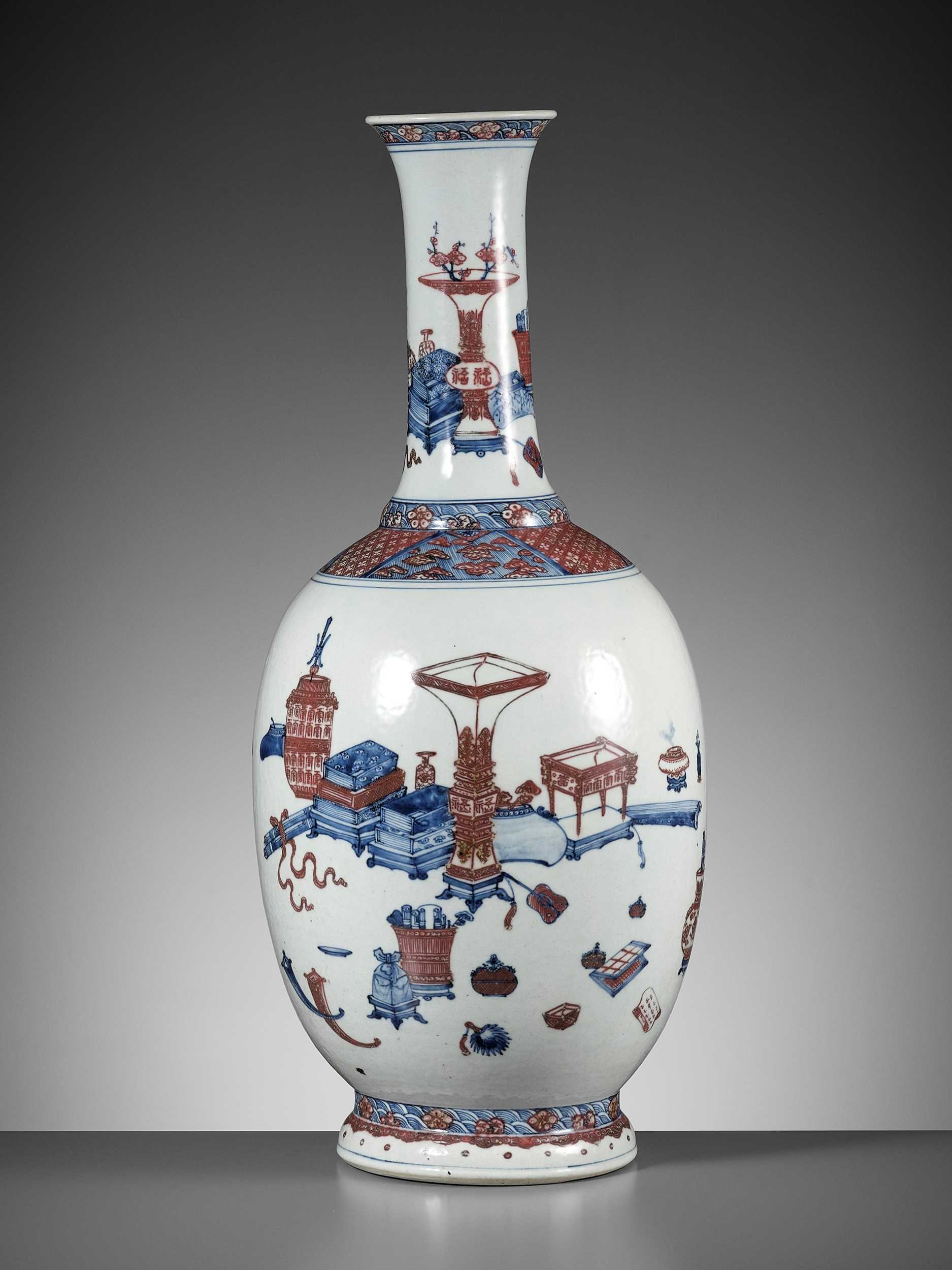 Lot 116 - A LARGE UNDERGLAZE-BLUE AND COPPER-RED-DECORATED ‘ANTIQUE TREASURES’ VASE, QIANLONG PERIOD