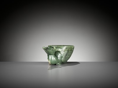 Lot 149 - A SPINACH GREEN JADE ‘DUCK’ LIBATION CUP, QING DYNASTY