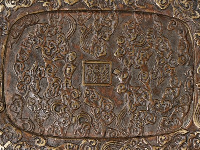 Lot 504 - A BRONZE ‘DRAGON’ HANDWARMER WITH OPENWORK COVER, QING DYNASTY