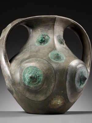 Lot 44 - A BLACK POTTERY AMPHORA WITH APPLIED BRONZE BOSSES, HAN DYNASTY