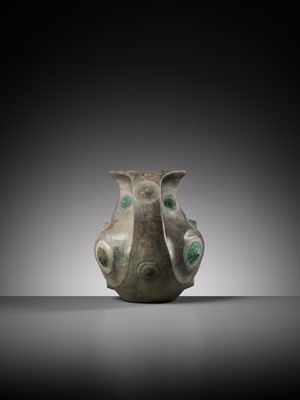 Lot 44 - A BLACK POTTERY AMPHORA WITH APPLIED BRONZE BOSSES, HAN DYNASTY