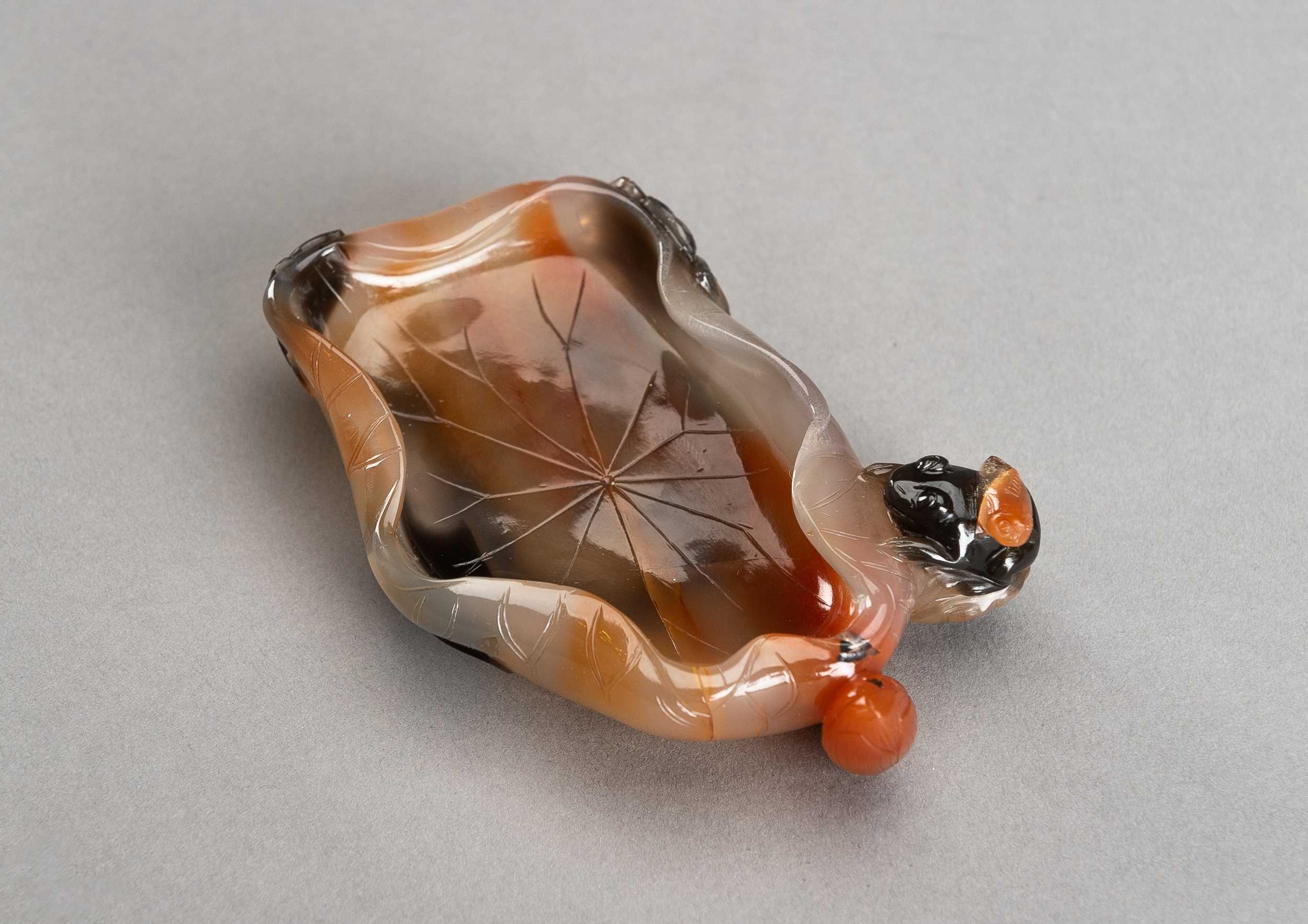 Lot 100 - AN AGATE ‘LOTUS’ WASHER, 1920s