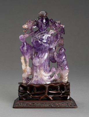 Lot 110 - AN AMETHYST GROUP OF MAGU, 1900s