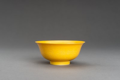 Lot 651 - A YELLOW GLAZED ‘DRAGONS’ PORCELAIN BOWL, GUANGXU MARK AND PROBABLY OF THE PERIOD