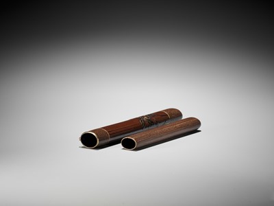 Lot 1605 - TAISAI: A FINE WOVEN RATTAN KISERUZUTSU WITH A LACQUERED DESIGN OF FRUITING YAKUBOJI