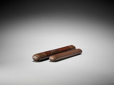 Lot 1605 - TAISAI: A FINE WOVEN RATTAN KISERUZUTSU WITH A LACQUERED DESIGN OF FRUITING YAKUBOJI