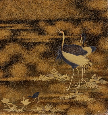 Lot 22 - A BLACK AND GOLD LACQUER SUZURIBAKO WITH A SHORELINE LANDSCAPE AND RED-CRESTED CRANES