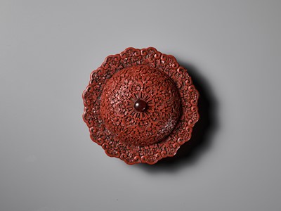 Lot 13 - A CARVED CINNABAR LACQUER ZHADOU AND COVER, 18TH CENTURY