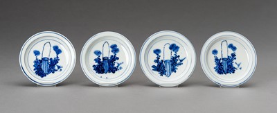 Lot 1215 - A SET OF FOUR SMALL BLUE AND WHITE ‘FLOWERS AND BASKET’ PORCELAIN DISHES