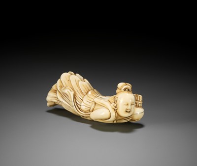 A SUPERB, LARGE AND RARE IVORY NETSUKE OF A TENNIN (BUDDHIST ANGEL)