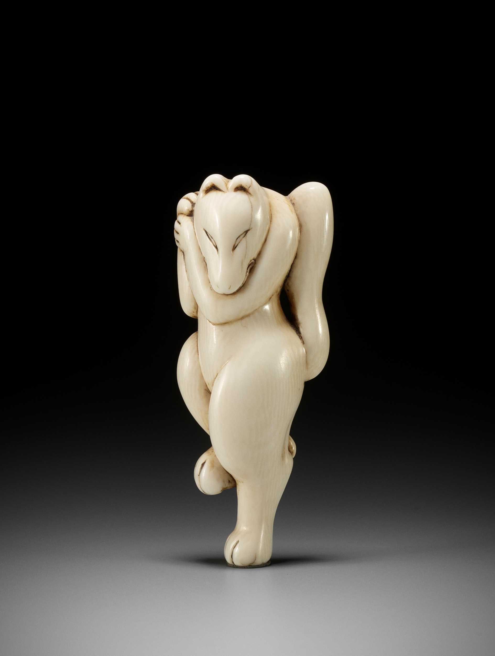 Netsuke Rabbit Dancing Lot 220 - AN EARLY IVORY NETSUKE OF A DANCING KITSUNE