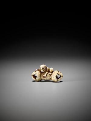 Lot 209 - A RARE IVORY NETSUKE OF AN ONI ON A KONGO (VAJRA)