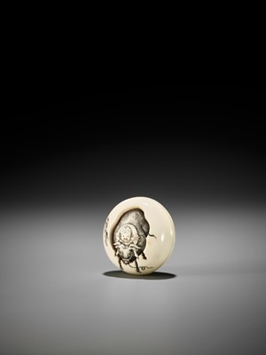 Lot 133 - KOJU: A FINE MANJU NETSUKE OF A BOY AS AN OX HERDER