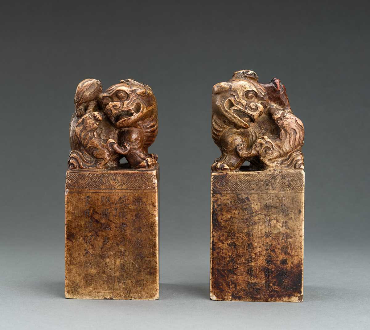 Lot 92 - A LARGE PAIR OF ‘BUDDHIST LIONS’ SOAPSTONE SEALS