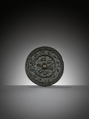 Lot 5 - A BRONZE ‘XINIU’ MIRROR STAND AND ‘LION AND GRAPEVINE’ MIRROR, MING AND TANG DYNASTY