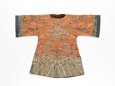 Lot 588 - A SALMON GROUND EMBROIDERED ‘DRAGON’ ROBE, QING DYNASTY
