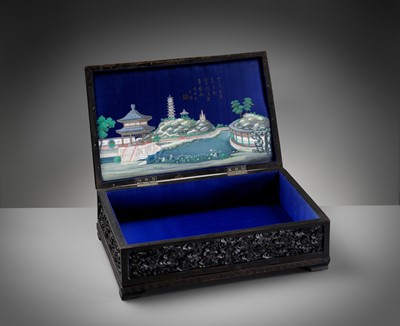 Lot 18 - AN IMPERIAL ‘DRAGON’ HARDWOOD CHEST, COMMEMORATING THE RENOVATION OF THE JADE PEAK PAGODA BY EMPEROR QIANLONG