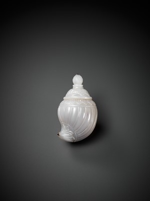 Lot 711 - A MUGHAL CARVED AND INLAID JADE FLASK