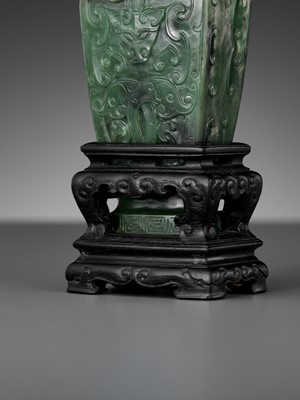 Lot 175 - A SPINACH GREEN JADE MINIATURE ‘ARCHAISTIC’ VASE, 18TH-19TH CENTURY