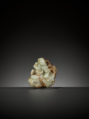 Lot 337 - A CELADON AND RUSSET JADE FIGURE OF A BOY RIDING A DRAGON-CARP, 17TH-18TH CENTURY