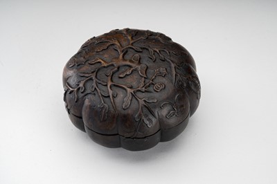 Lot 33 - A MELON-SHAPED CARVED WOODEN BOX, QING