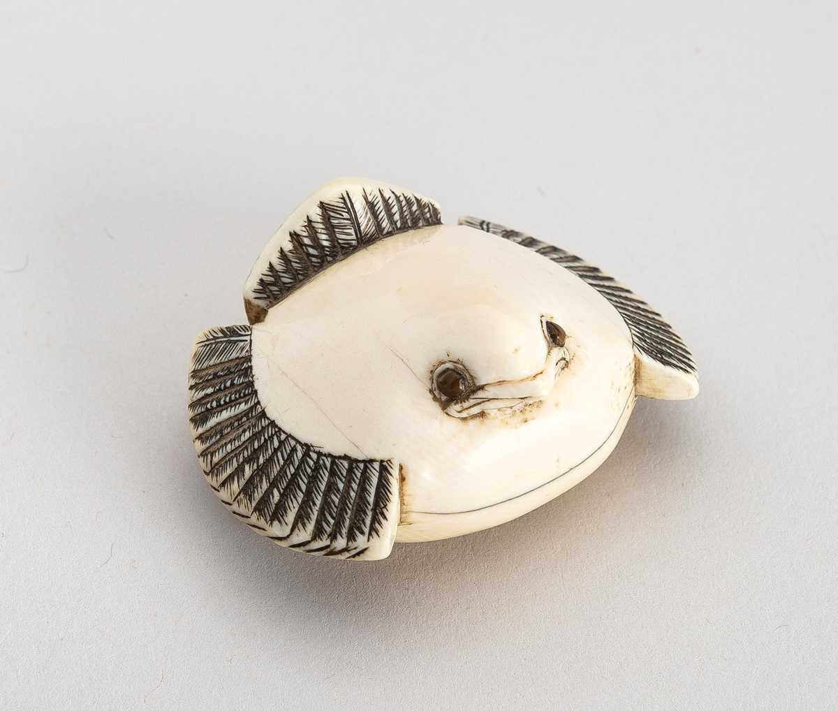 Lot 1382 - OKATOMO: AN IVORY NETSUKE OF THE FUKURA SUZUME