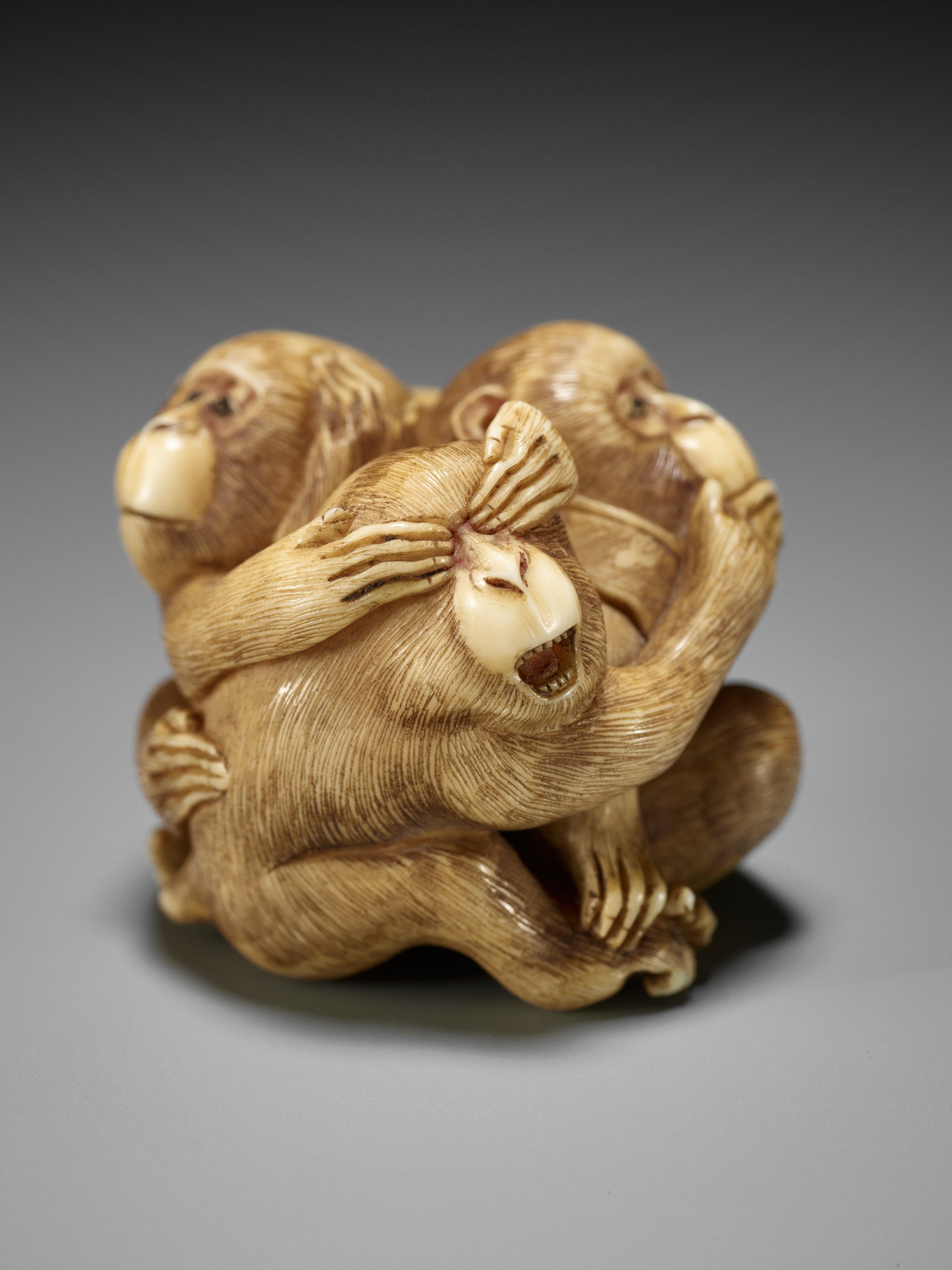Lot 139 - MASATAMI: A RARE IVORY NETSUKE OF THE