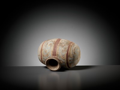 Lot 372 - AN ABSTRACTLY PAINTED POTTERY COCOON JAR, HAN DYNASTY