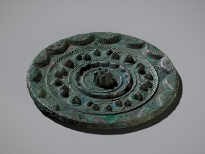Lot 468 - A ‘CLOUD AND NEBULAE’ BRONZE MIRROR, HAN DYNASTY