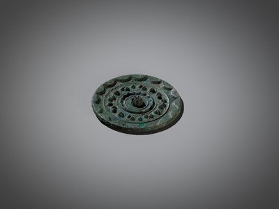 Lot 468 - A ‘CLOUD AND NEBULAE’ BRONZE MIRROR, HAN DYNASTY