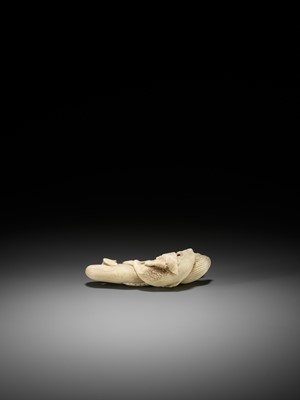 Lot 161 - BISHU: A LARGE BONE NETSUKE OF A WHALE WITH YOUNG