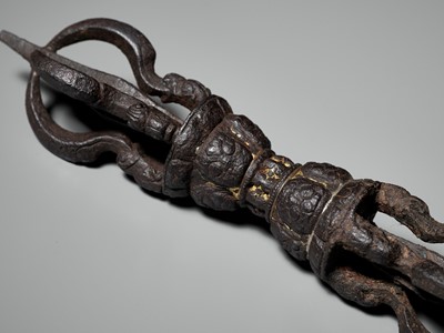 Lot 546 - A GOLD AND SILVER DAMASCENED IRON VAJRA, TIBET, 12TH CENTURY