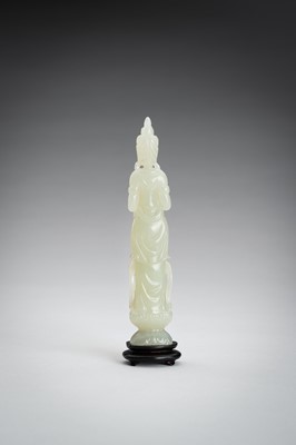 Lot 161 - A PALE CELADON JADE CARVING OF A GUANYIN, 1900s