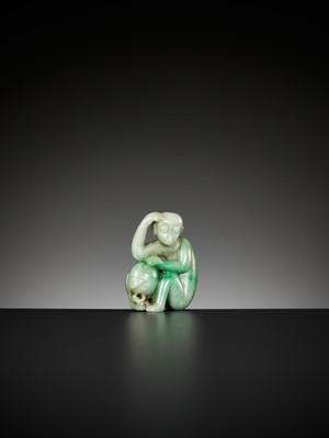 Lot 365 - A JADEITE PENDANT OF A MONKEY WITH PEACH, LATE QING TO REPUBLIC