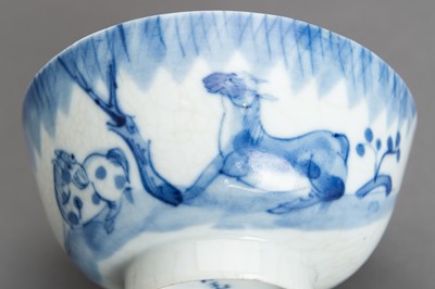 Lot 608 - A BLUE AND WHITE PORCELAIN ‘BATS AND HORSES’ BOWL, QING